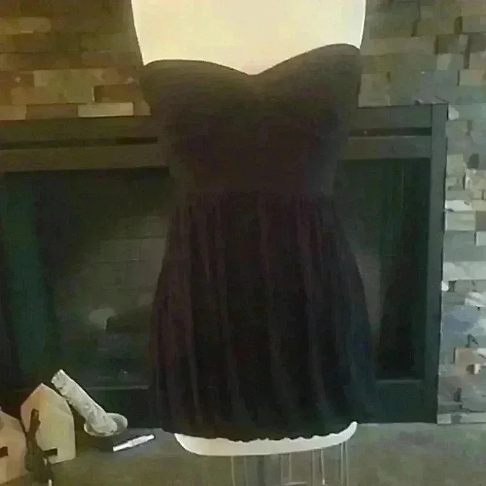 Black strapless knit dress with bubble hem